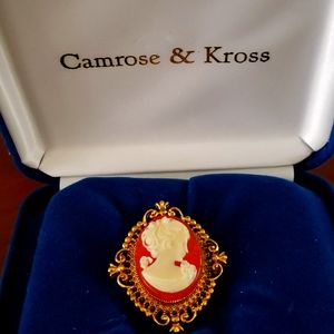 Antique brooch and locket. It is signed Avon and was among my Mother's jewelry.